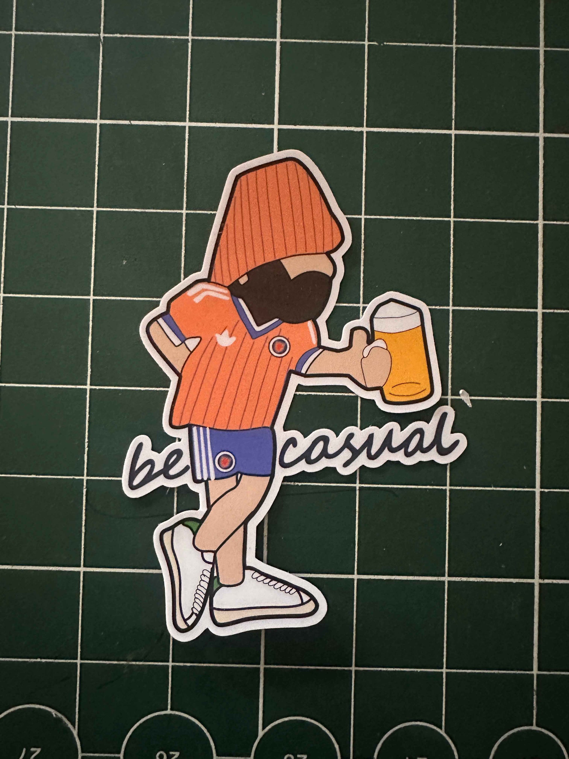 Be Casual scotland sticker in scotland away kit holding a beer subculture 